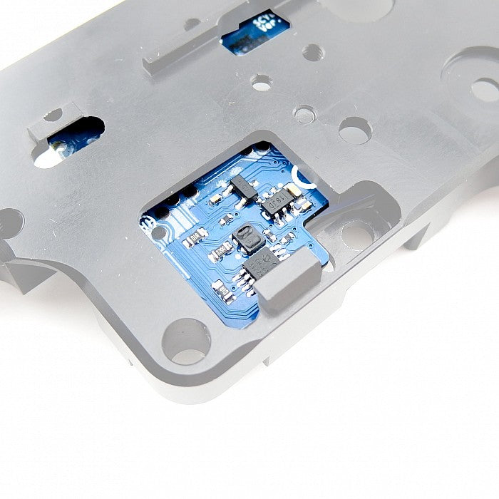 Backside of Jefftron Scylla V2 rear wired MOSFET installed in V2 AEG gearbox showing rear board circuitry and sensor components