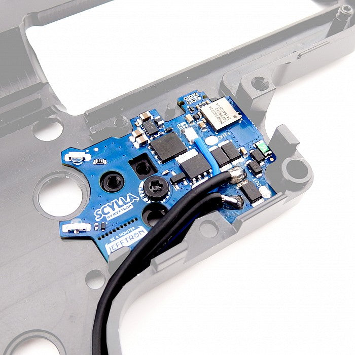 Jefftron Scylla V2 rear wired MOSFET installed in V2 AEG gearbox showing wiring layout and trigger board positioning
