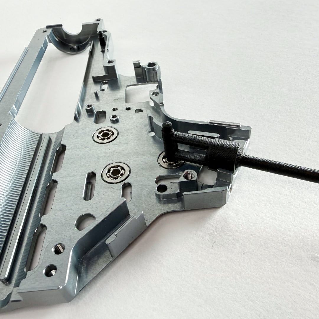 Carbon fiber reinforced AEG motor alignment tool compatible with Retro Arms shells